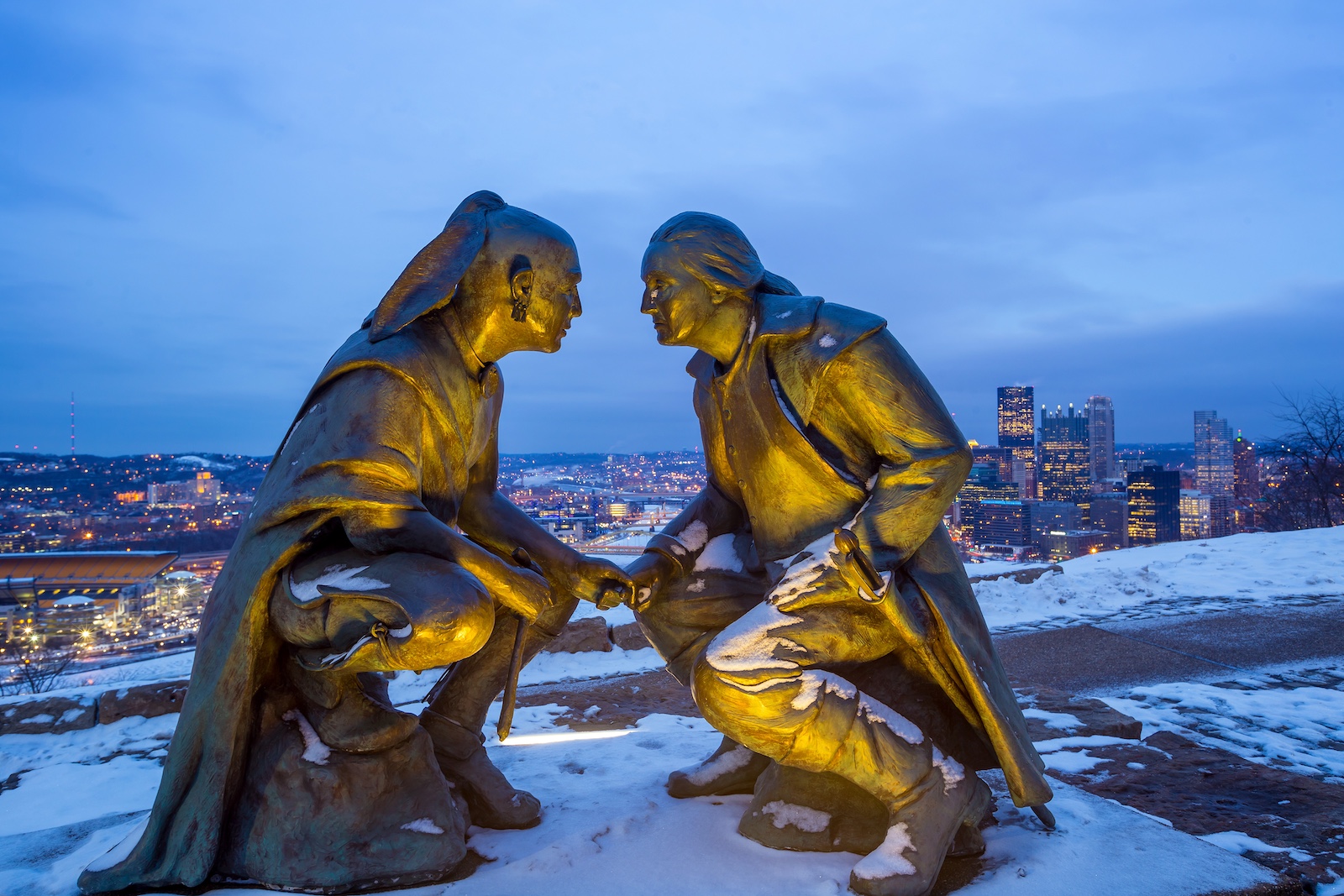 Snowy skyline of downtown Pittsburgh at twilight